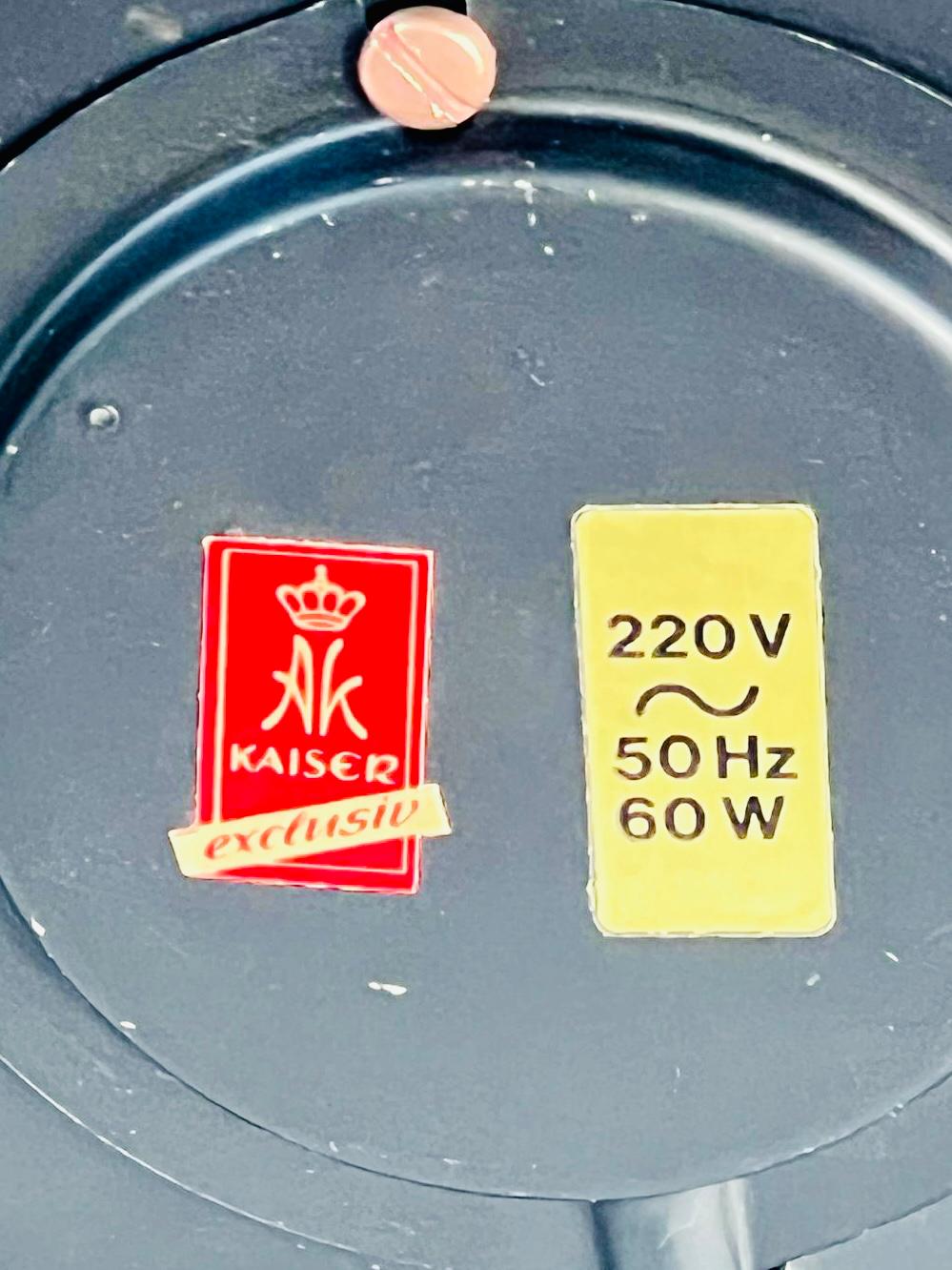 AK Kaiser lamp base sticker on white and gold lamp