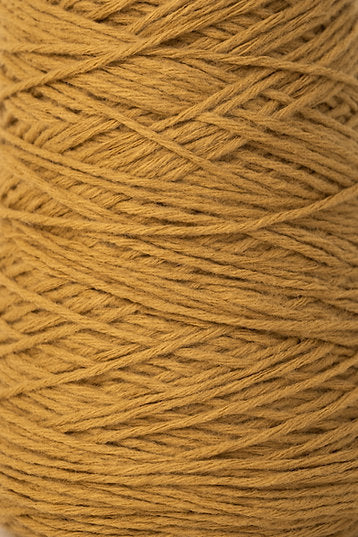 Close up of camel coloured tufting yarn
