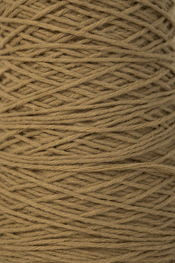 Close up of light brown tufting yarn