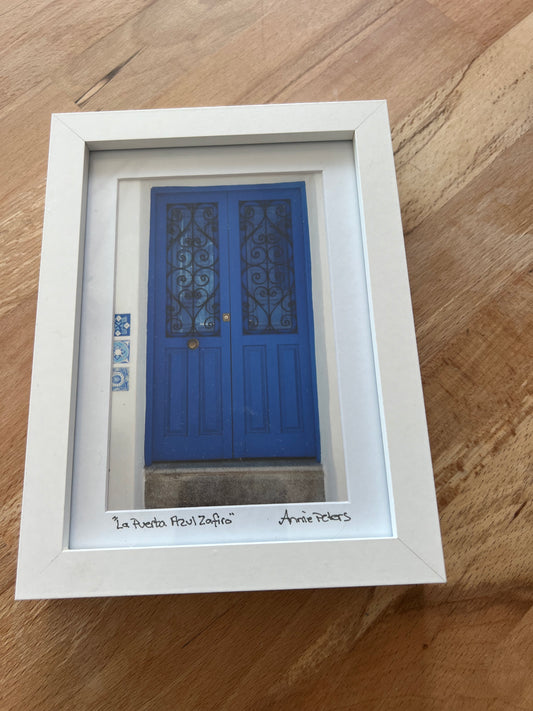 Framed and signed photograph of blue door by Annie Peters