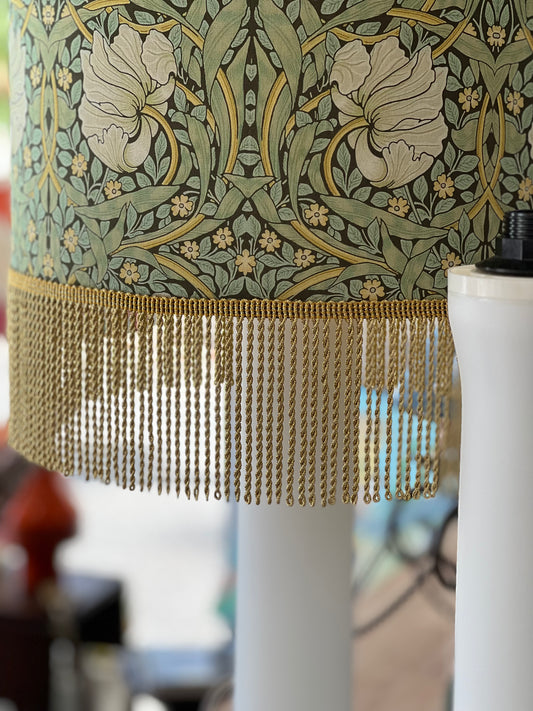 William Morris print lampshade with fringe on white lamp base