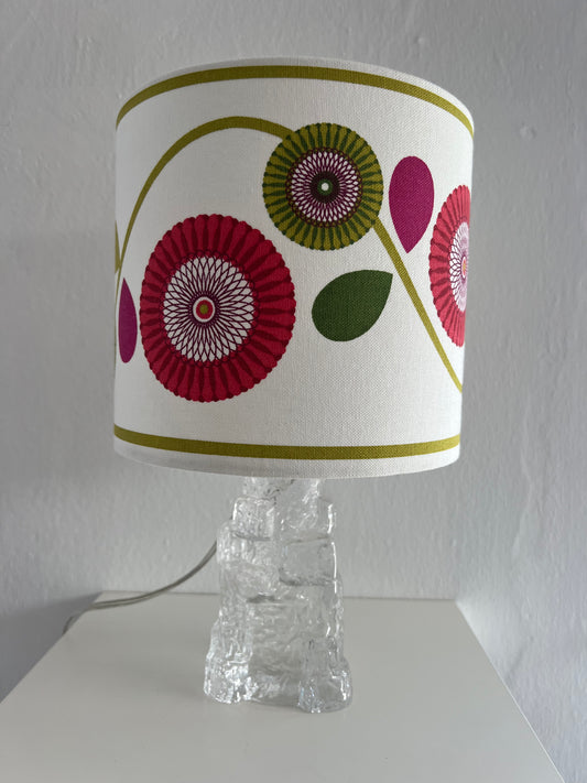 Glass lamp base with lampshade with white background