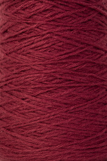 Close up of mauve tufting yarn