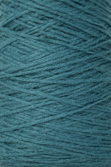 Close up of petrol blue tufting yarn