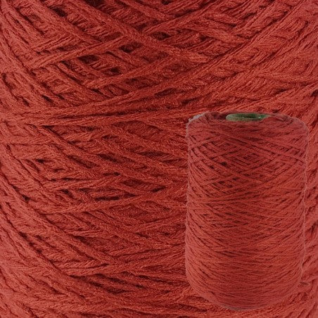 A plum cone of acrylic yarn for tufting, with a close-up section showing the texture of the yarn.