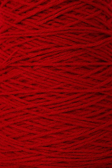 Close up of red tufting yarn