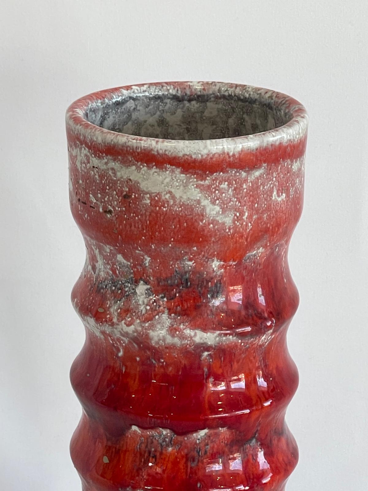 Red ceramic vase with ring details