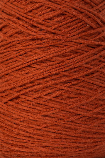 Close up of rust coloured tufting yarn