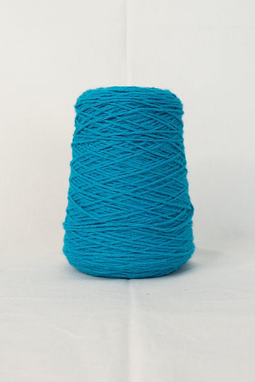 A turquoise-colored cone of acrylic yarn for tufting projects, displayed against a neutral background.