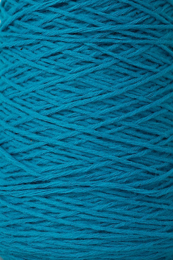 Close up of turquoise tufting yarn