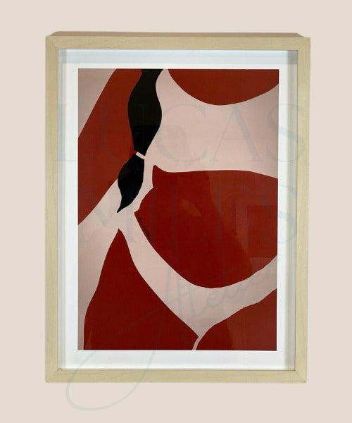 A framed digital print featuring a red and black geometric pattern, part of the Yogis collection by Noor Houtakkers.