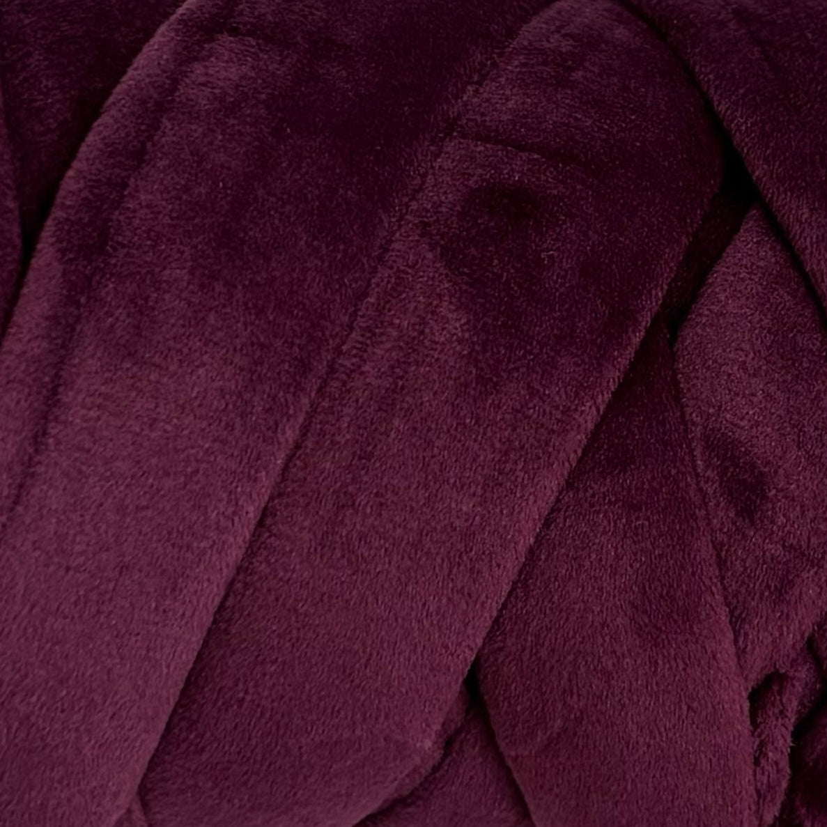 Close-up of a burgundy fabric texture
