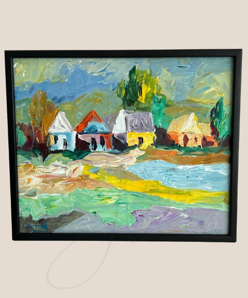 A framed acrylic painting depicting a lake house scene with a vibrant mix of colors, predominantly yellow and blue, with a rural landscape in the background.