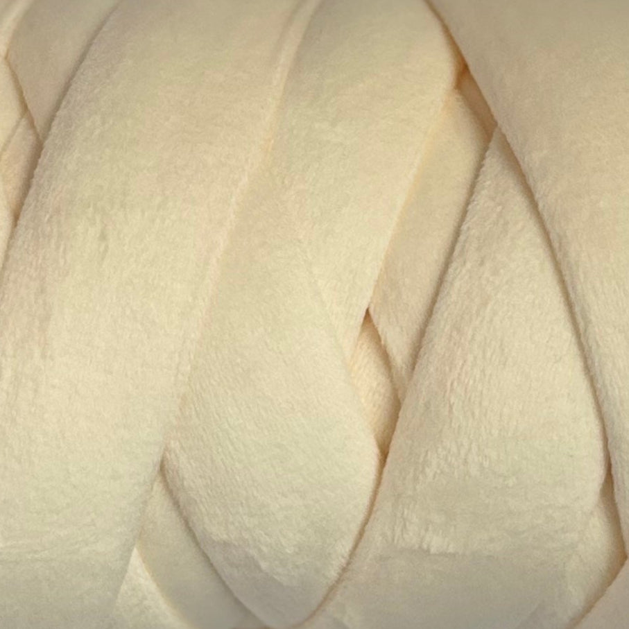 Close-up of a ball of cream velvet yarn