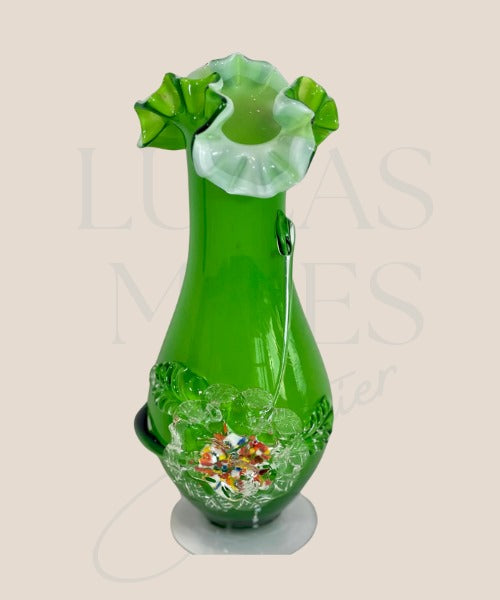 A vintage apple green art-glass Murano-style vase with a floral motif and a white interior, signed by no one.