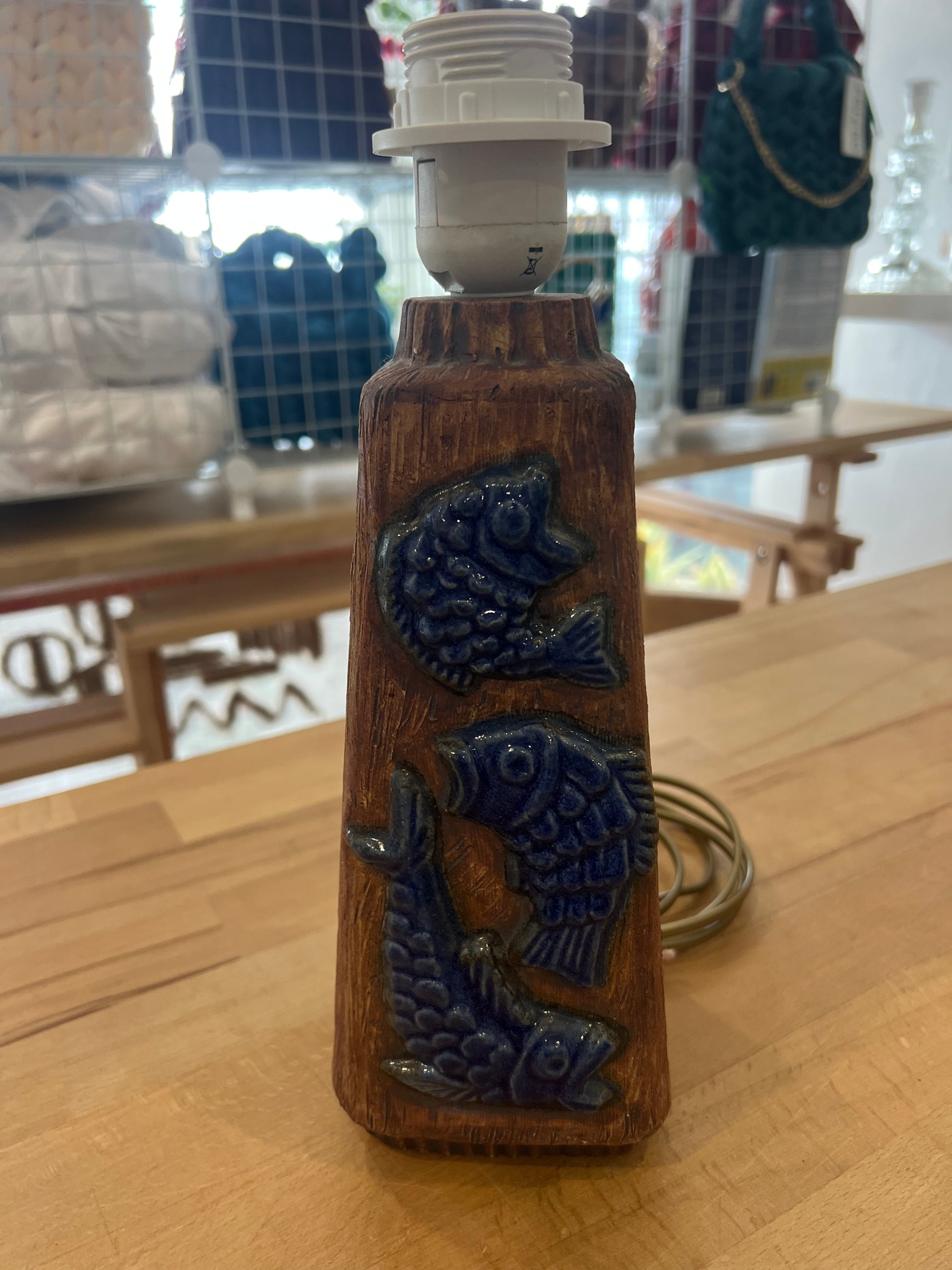 Ceramic lamp with fish designs 