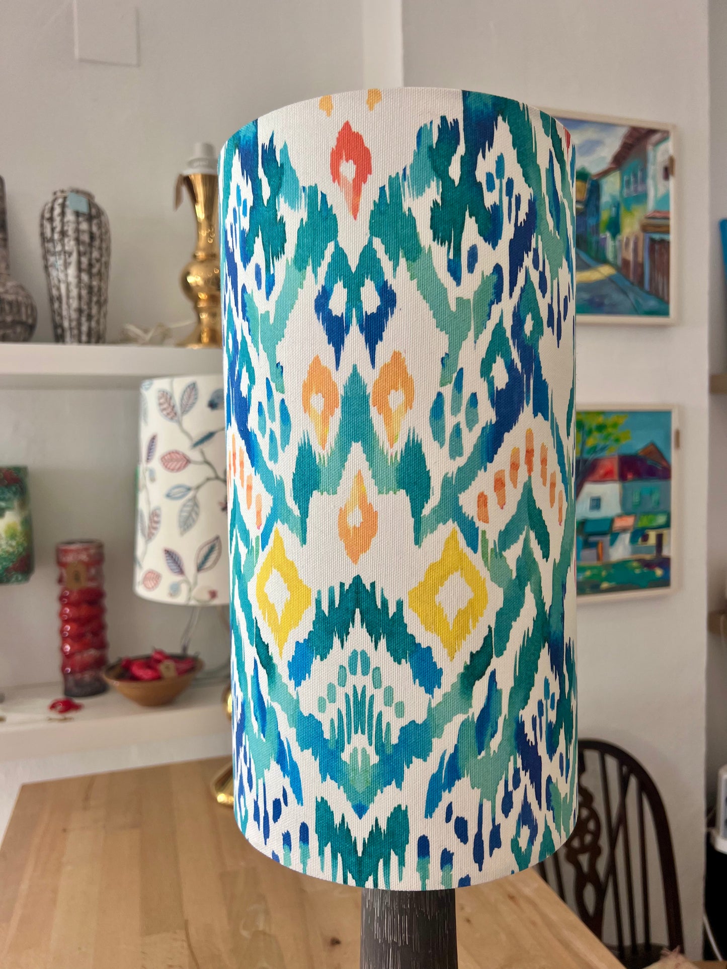 Close-up  lampshade with a colorful geometric ikat pattern 