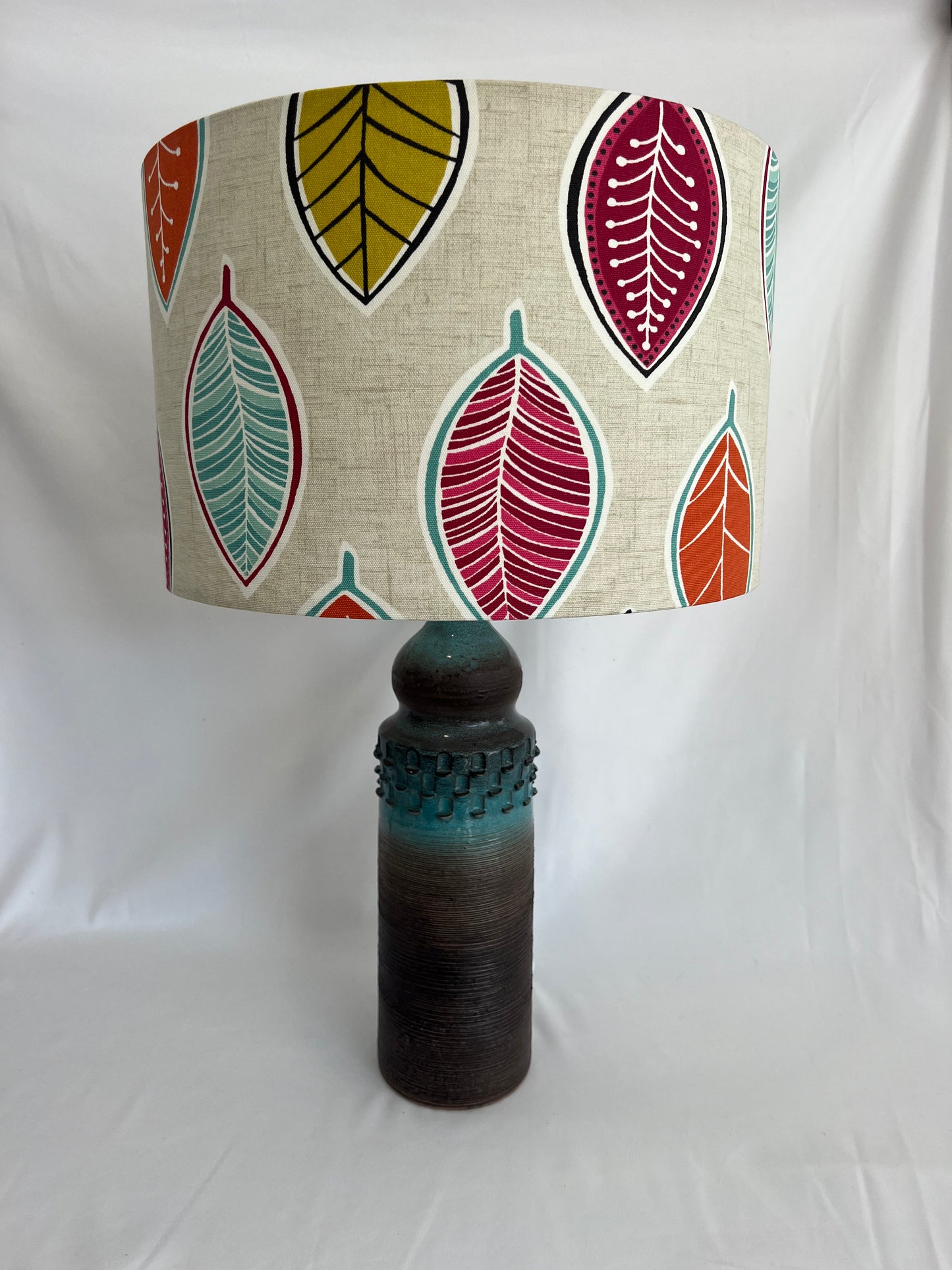 Leaf motif lampshade on lamp base