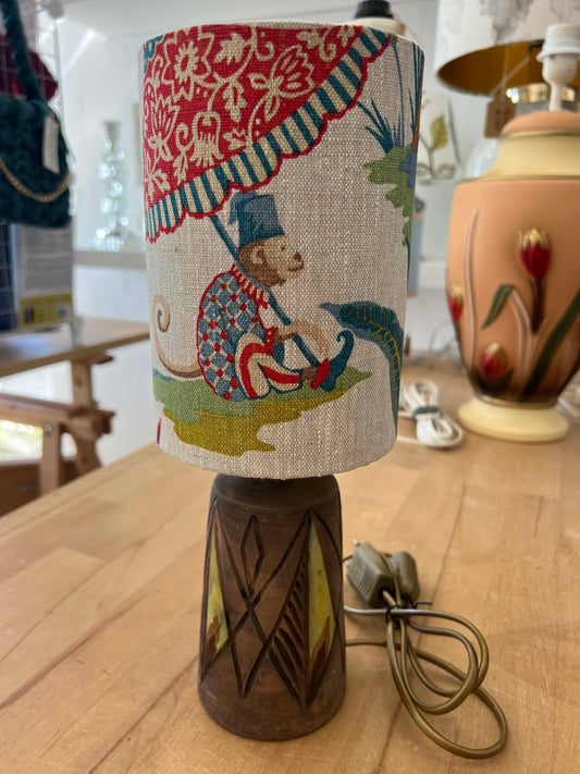 Decorative ceramic lamp with a colorful monkey linen lampshade 