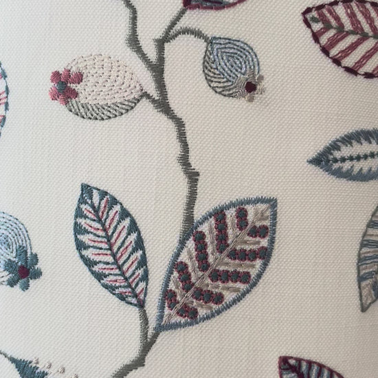 White linen embroidered lampshade on swedish retro gold glass lamp base